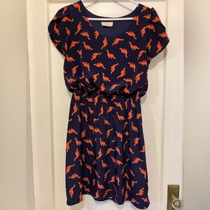 Navy Dress with Orange Dinosaurs